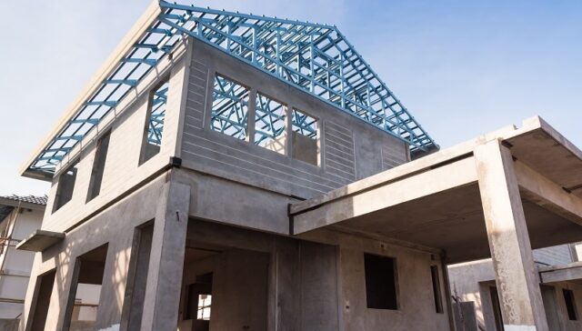 A single-family home being built by precast concrete components